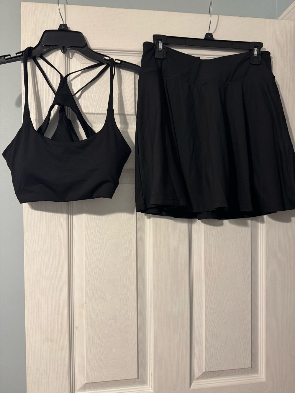 Fabletics Black Strappy Sports Bra and Skirted Short Set